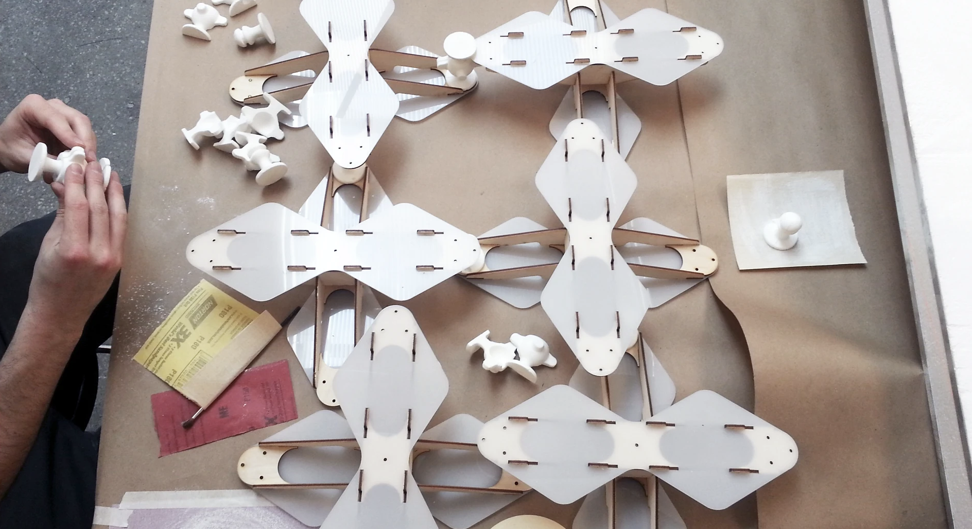 Hand-cast components on assembly workbench